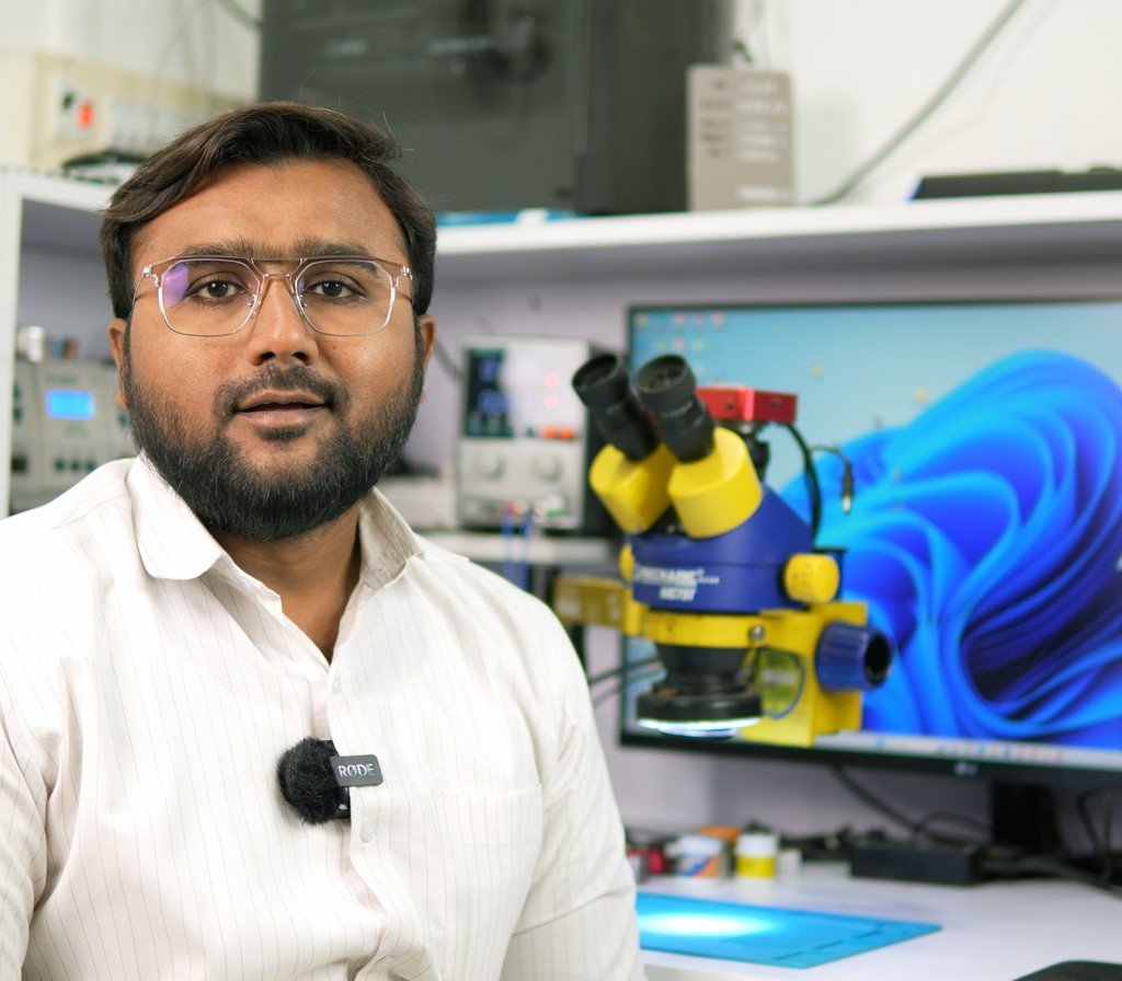 Syed Idrees, founder of Noon Computers, at the chip-level repair bench in Vellore